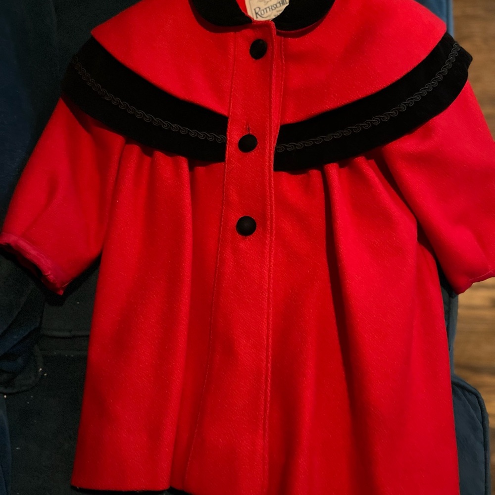 Beautiful vintage red dress coat and black velvet hat.